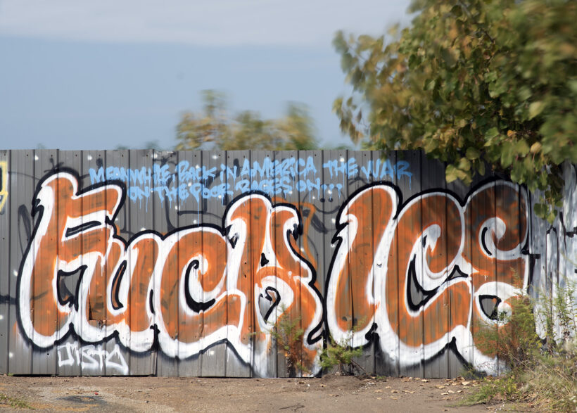 Fuck Ice is graffiti on a fence in cleveland oh