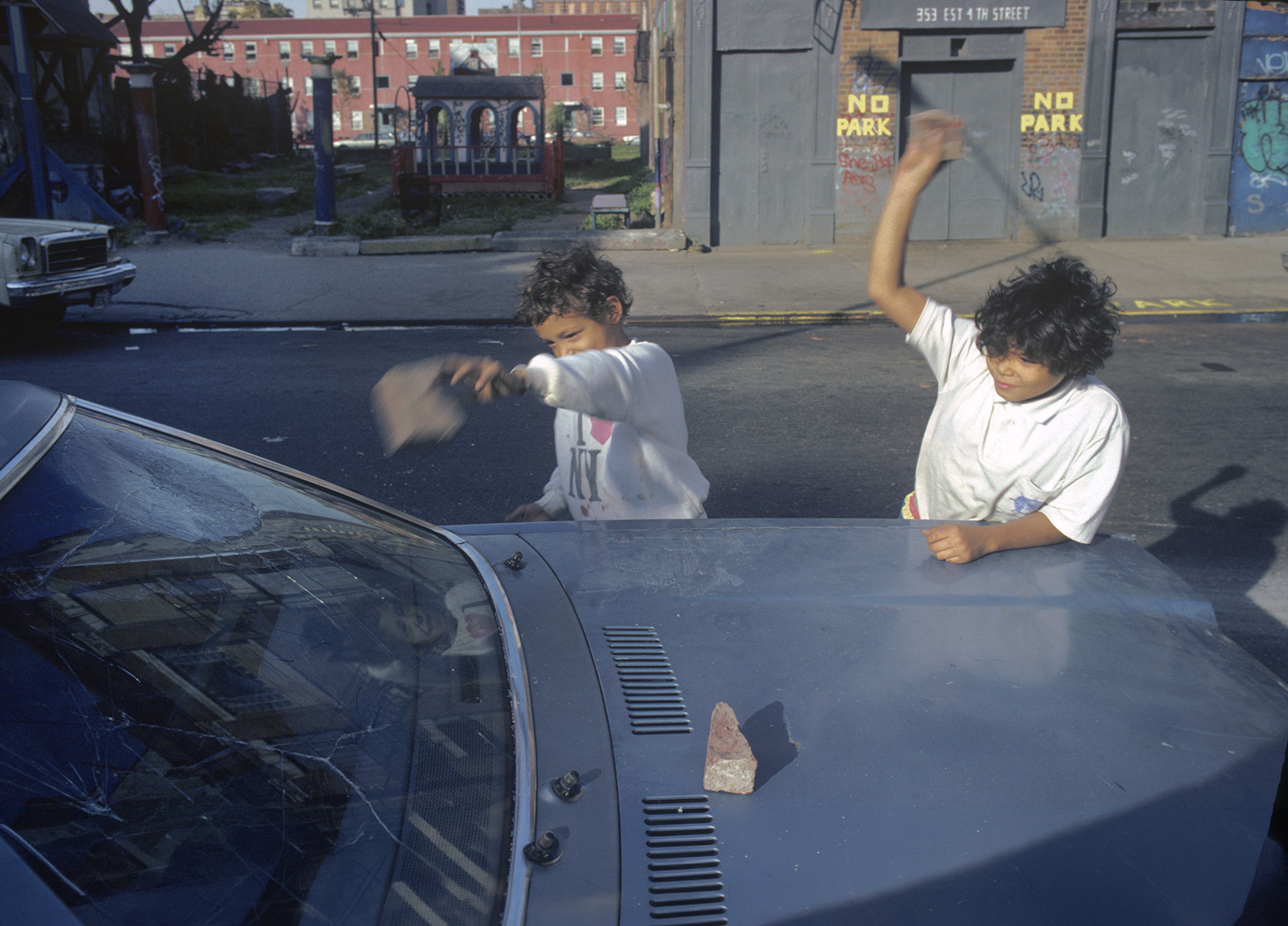 Kids Smash Cars With Rocks, Est 4th Street