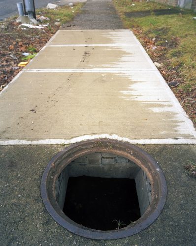Hole in Sidewalk, Holton Avenue, Forgotten Triangle